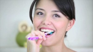 pretty-girl-brushing-teeth